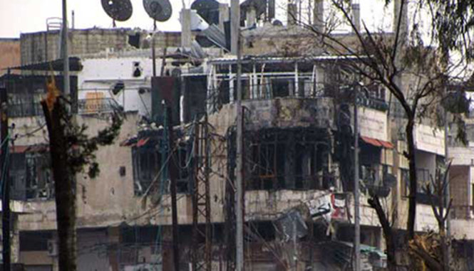 IS thảm sát thành phố phía đông Syria khiến hàng trăm người thiệt mạng - Ảnh: AFP