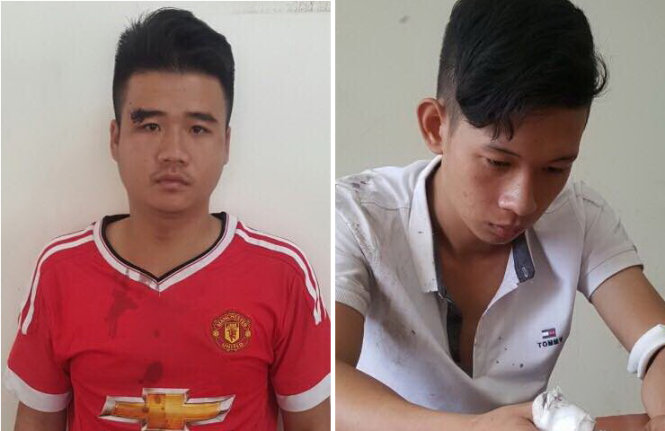 Nguyễn Ngọc Hồ (áo trắng) và Trần Thanh Phú (áo đỏ) tại công an quận 7.
