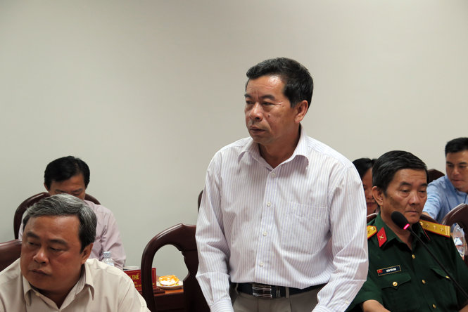 Đại tá Hồ Văn Hiệp - Trưởng công an quận 3 đang trả lời chất vấn của Bí thư Thành ủy  - Ảnh: VS