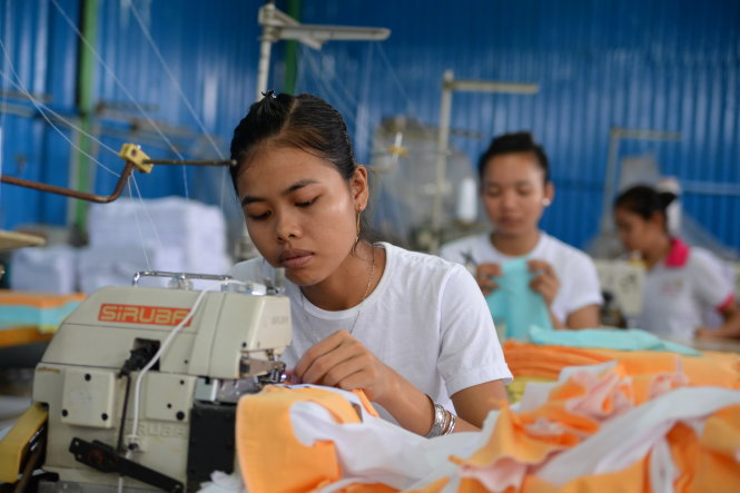 Ngoài việc giảm thuế, doanh nghiệp cũng rất cần một môi trường kinh doanh minh bạch, bình đẳng - Ảnh: HỮU KHOA