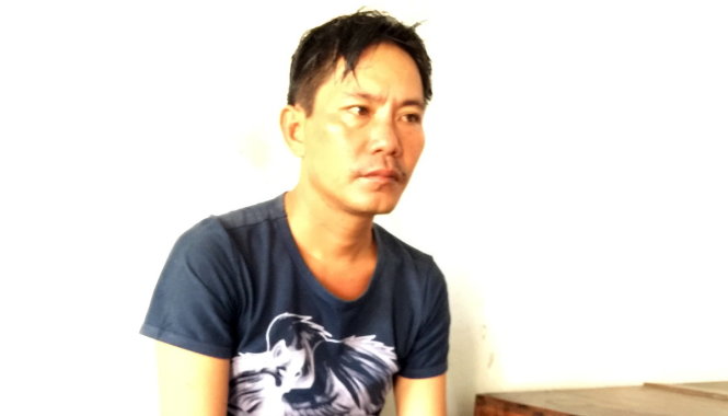 Nguyễn Hữu Tài tại cơ quan công an - Ảnh: HOÀI THƯƠNG