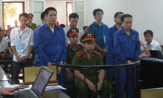 Các bị cáo tại tòa sáng 27-7 - Ảnh: T.L