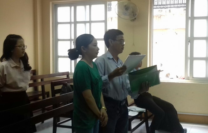 Ông Thanh và bà Oanh tại tòa - Ảnh: TUYẾT MAI