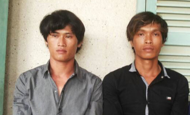 2 bị can Linh và Tình tại cơ quan điều tra - Ảnh: TIẾN VINH