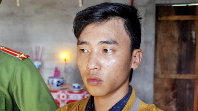 Nghi can Phan Thanh Tâm bị công an bắt giữ - Ảnh: TR.T.