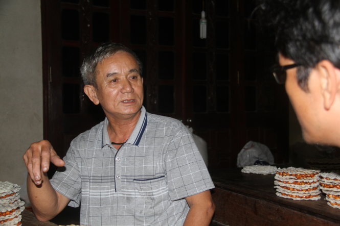 Ông Đặng Xuân Thy nhớ về những ngày tháng “nhường đất dỡ nhà” của gia đình mình để  xây dựng công trình hồ Kẻ Gỗ - Ảnh: Hữu Khá