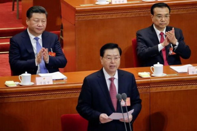 Ông Trương Đức Giang (giữa) phát biểu tại phiên mở đầu Đại hội đại biểu nhân dân toàn quốc tại Đại lễ đường Nhân dân ở Bắc Kinh, Trung Quốc ngày 5-3-2017 - Ảnh: Reuters