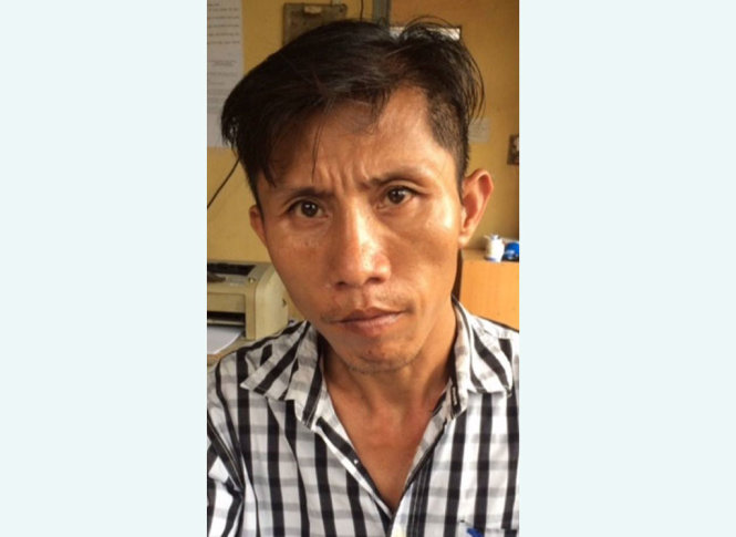 Trương Thành Quang tại cơ quan công an - Ảnh: Công an cung cấp