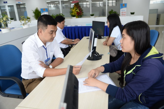 Tư vấn cho hộ kinh doanh tại Cục thuế TP.HCM. Ảnh: Tự Trung
