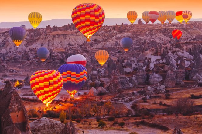 Not many destinations in the world inspire such wanderlust as the Turkish Cappadocia mountains, best enjoyed from a hot air balloon at sunrise © Shutterstock / Symonenko Viktoriia