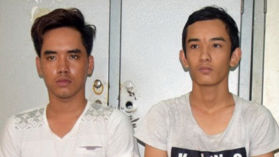 Nghi can Nghĩa (trái) và Đăng - Ảnh: K.T