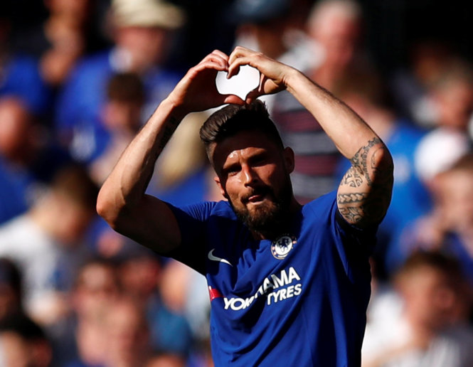 Giroud ăn mừng bàn mở tỉ số cho Chelsea. Ảnh: REUTERS