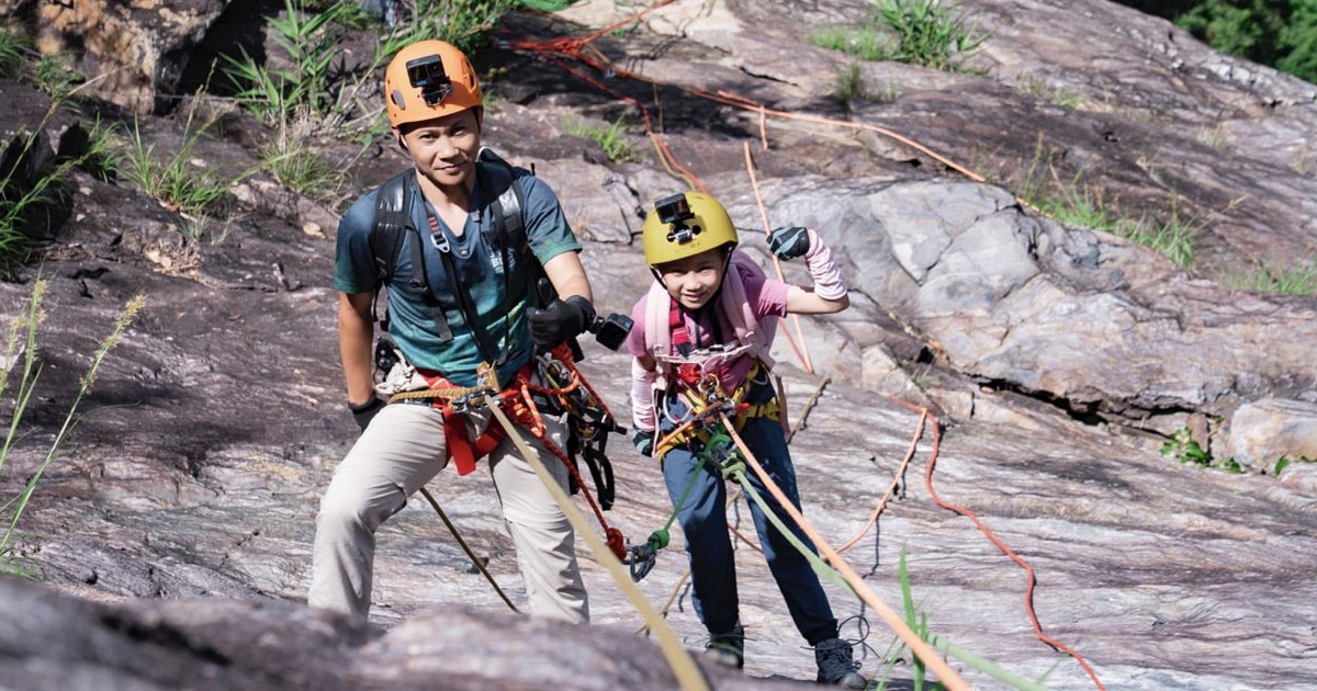 Vietnamese cave explorer, 12-year-old daughter conquer 300-meter waterfall in Hue