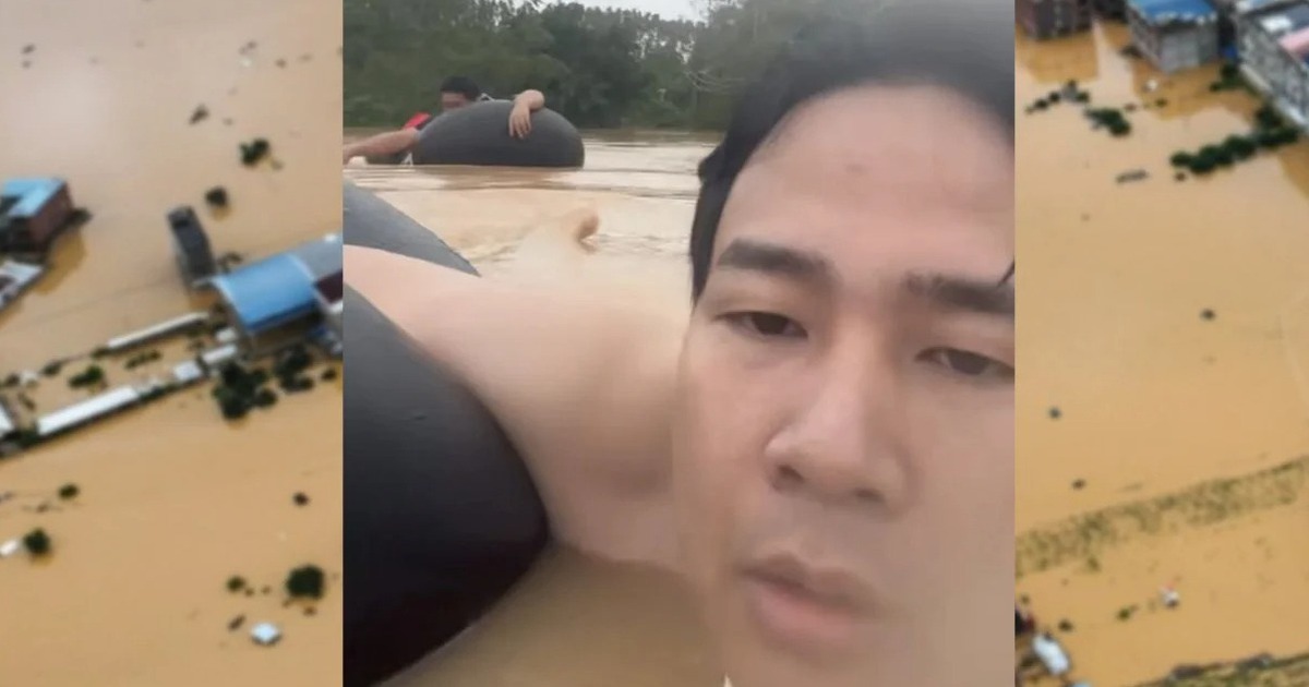 Người đàn ông Trung Quốc ôm lốp xe bơi 3 tiếng giữa dòng nước lũ về nhà tìm cha