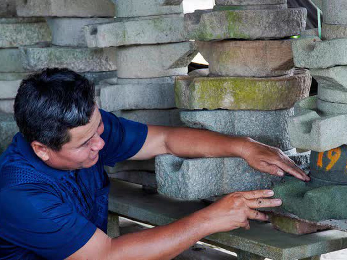 Vietnamese farmer preserves rural memories through collection of centuries-old stone mills