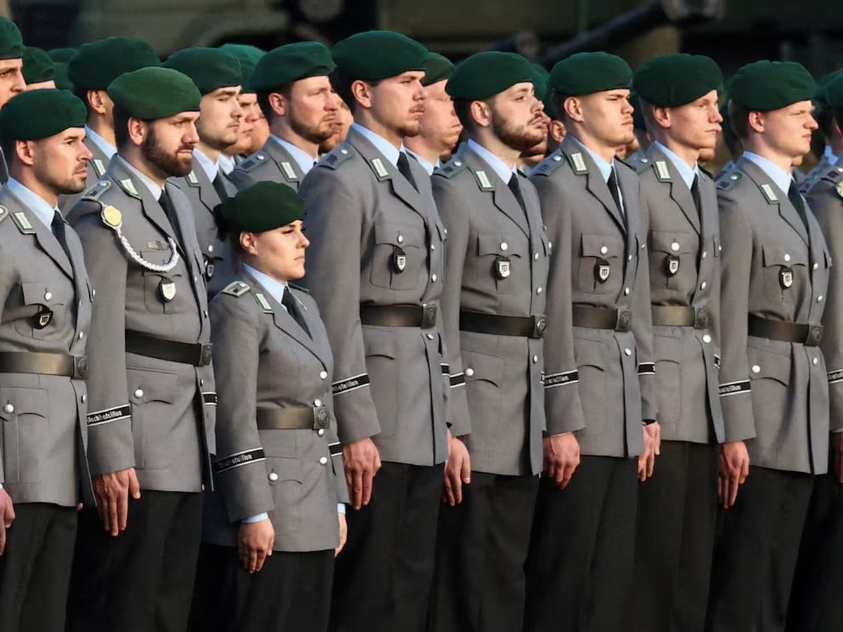 Germany works to clarify new rules on fighting-age men leaving country