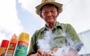 In Ho Chi Minh City, a lighter refiller carries on with a vanishing trade