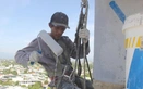 Would you work dozens of meters above the ground in 40-degree heat in Vietnam?