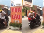 Bố đỡ con gái xuống xe theo phong cách 'có một không hai'