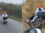 Hai cô gái ôm cua xe máy đi vào vách núi