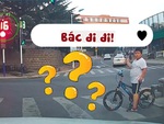 Cậu bé thách thức tài xế ô tô vượt đèn đỏ