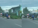 Người đàn ông say rượu tông văng thùng rác