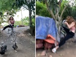 Cô gái đi xe đạp mất phanh lao dốc tông vào gốc cây