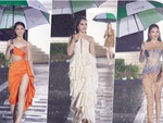 Người đẹp Hoa khôi sông Vàm che ô đi catwalk dưới mưa