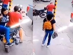 Chàng trai chạy xe máy bỏ rơi bạn gái mà không hay biết