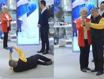 Cụ ông lăn xả chụp hình cho vợ