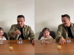 Bé gái mếu máo khi bắt chước bố bị ăn cú lừa