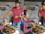Vợ ngồi livestream nuốt nước miếng khi chồng đứng ăn me trước mặt