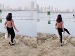 Người đẹp sút chai nước đá bay guốc xuống hồ
