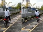Cô gái lái xe máy nhảy như cóc khi qua gờ giảm tốc