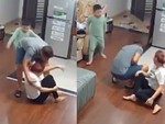 Con trai đá chỗ hiểm của bố để bảo vệ mẹ