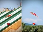 Người đàn ông chơi cầu tuột xuống bể bơi kiểu 'nàng tiên cá'