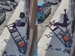 Cô gái ngã chổng vó khi leo thang