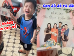Bé trai khóc nức nở vì xem ảnh cưới bố mẹ không thấy mình