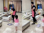 Bố trẻ thích sống ảo, tạo dáng lau nhà để con gái chụp hình