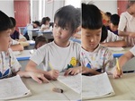 Bé gái chia lại bàn khi bị bạn nhắc nhở vượt ranh giới