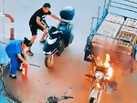Nữ nhân viên bình tĩnh khi xe ba gác vào đổ xăng bị cháy