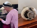 Cụ bà bê cả nồi cơm điện lên bếp gas để nấu cháo
