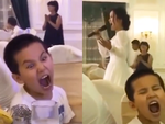 Biểu cảm hài hước của bé trai khi nhại theo mẹ hát opera ở đám cưới
