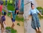 Mẹ 'vồ ếch' khi cầm roi ra dí con tắm mưa