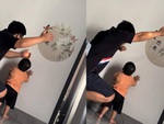 Bé trai thích thú khi xem bố làm ảo thuật