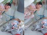 Mẹ bỉm sữa lầy lội nằm võng cho con ru ngủ