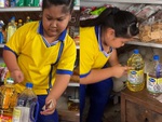 Bé gái mua dầu ăn áp lực ngang với chủ tiệm tạp hóa