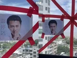 Netizen Trung Quốc dán hình Tạ Đình Phong lên cửa kính để chống bão
