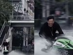 CEO lái mô tô nước giữa đường Bangkok ngập