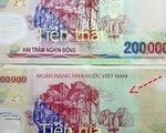 Rút tiền ngân hàng gặp tiền giả, khách phải chịu thiệt?